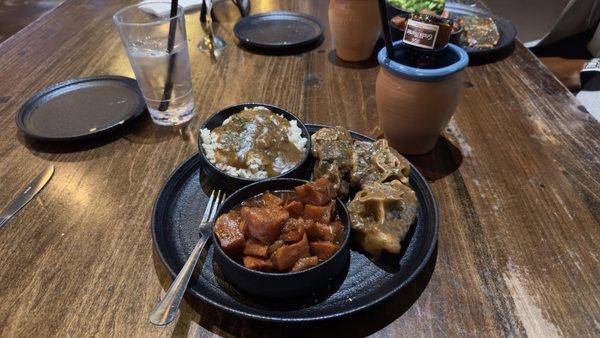 Oxtail, yams, and rice with gravy. Yams were the perfect amount of sweet to match the savory of the other two.