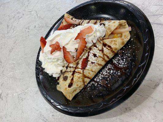 Variation made not from the menu...peaches, strawberries, chocolate syrup, chocolate chips, and whipped cream!