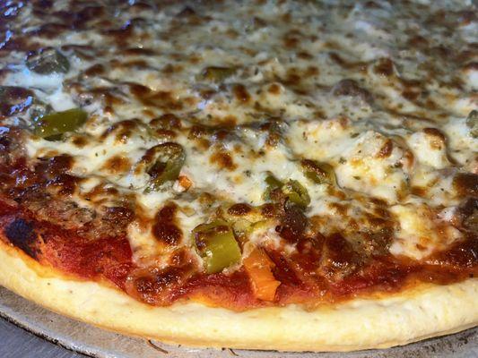 The Chicago Combo Pizza with Italian Beef, sliced link sausage, and hot giardiniera!