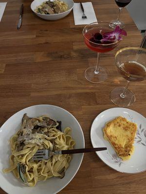 House-made Tagliatelle with fire roasted Mushrooms, a side of crisped polenta, and a hibiscus martini and manhattan