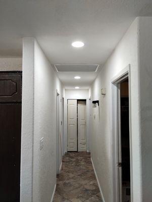 Recess lighting installed in hallway.