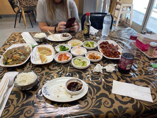 Jap Chae on the left, the side items, and pork bulgogi on the far right.