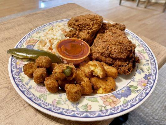 3 piece combo with corn fritters, fried okra, coke slaw and some jalapeños and hot sauce for that extra kick.