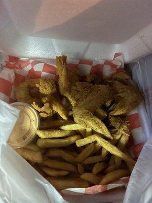 Fried chicken and shrimp and fries