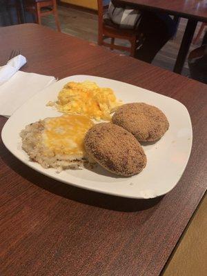 Salmon croquets, scrambled eggs, cheesy hash browns