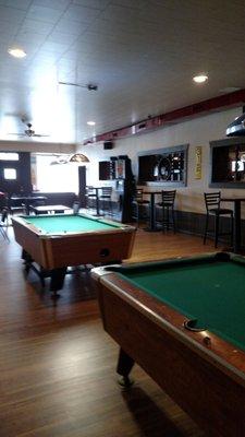 Play a few games of pool and darts in the completed remodeled game room