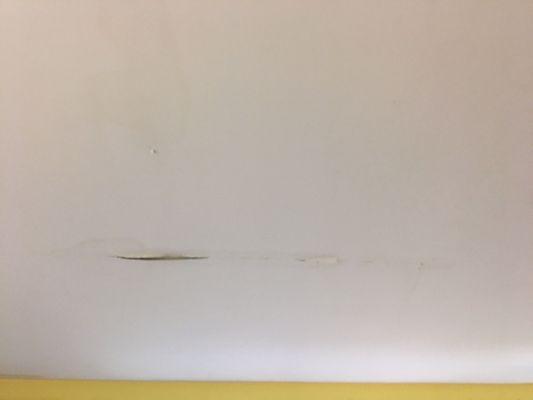 Damaged ceiling from the leaky roof