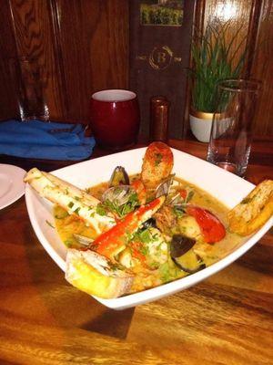 Warm up with this weekends feature: Saffron Cioppino with King Crab Legs, Mussels, Clams, Calamari, and Scallop topped served w/ Crostini!