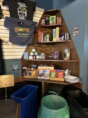 Merchandise, food for sale and game library