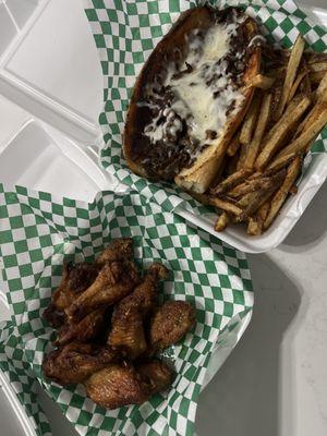 Lemon pepper wings. Philly cheese steak and fresh cut fries.