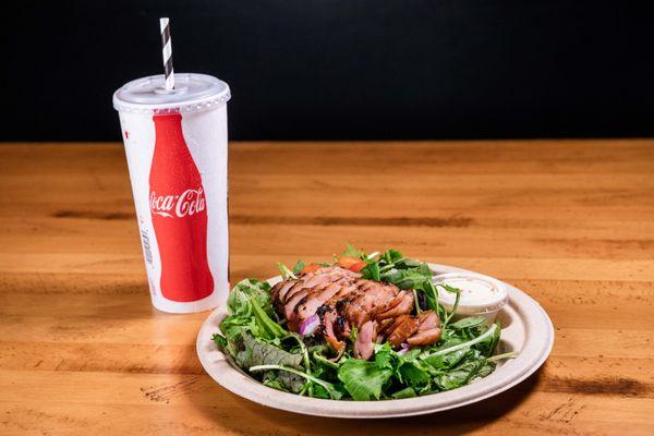 Smoked Chicken Salad, with Kahumana Mixed Greens, Grape Tomatoes, Dried Cranberries, Sunflower Seeds, and our house Creamy Vinaigrette.