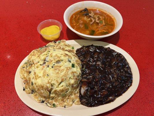 Jajangbap Shrimp Omelet over rice with Black Bean Sauce and spicy Pork and Seafood soup.