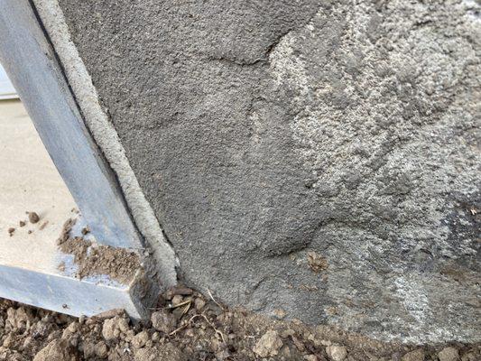 "HYDRAULIC" CEMENT SLATHERED ON WALL TO "FIX" SLEDGEHAMMER DAMAGE