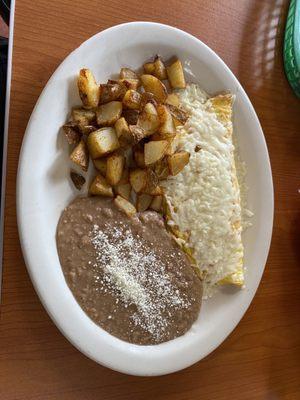 Cheese omelette with potatoes and beans