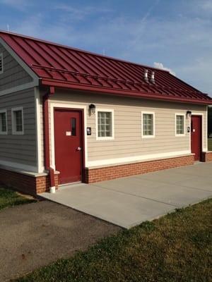 Solid structure bathrooms, instead of porta potties.