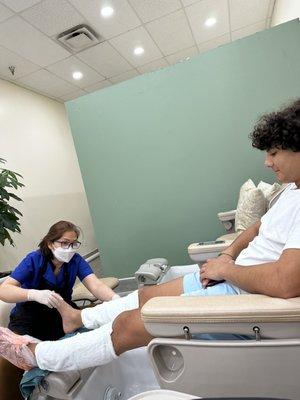 My husband getting a pedicure