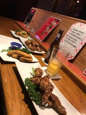 A little bit of everything: Vietnamese wings, fried mushrooms & fried Jalapeño Cream Cheese Poppers...took 25 minutes for the fried apps