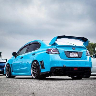 Wrx wrapped in inozetek miami blue & 3m gloss black accents