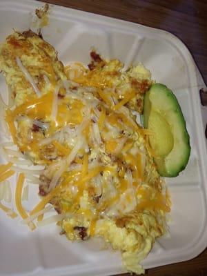 $3 scramble with bacon, avocado, cheese. I'd guess this is 3 eggs worth! Large portion...