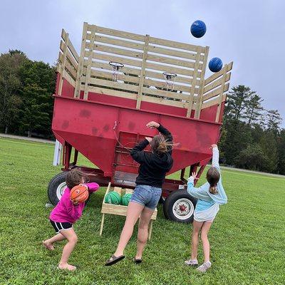 Play a game of "Horse" at our barnyard basketball.