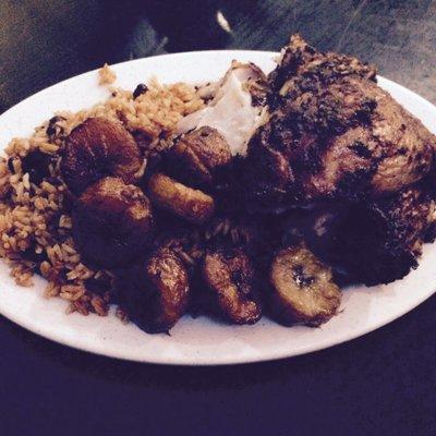 Half chicken , with rice & beans and sweet plantains. Soooo good! $8 and it's enough for 2!