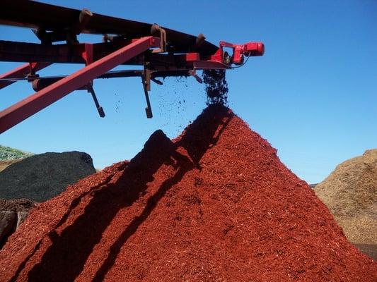 Colored Mulch being produced from recycled lumber at the Zanker Road Landfill