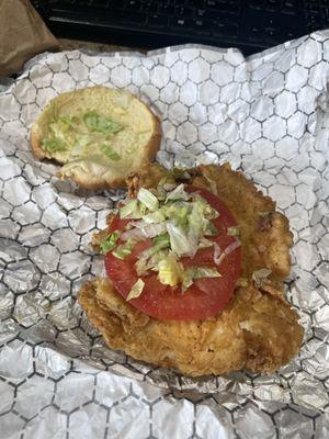 Deep fried chicken breast with mayo lettuce and tomato