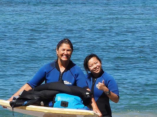 Coming out of the water.  Suzzy is on the left.