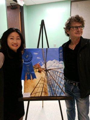 Chung and her instructor Thomas Cleveland at the Houston Art Society Show