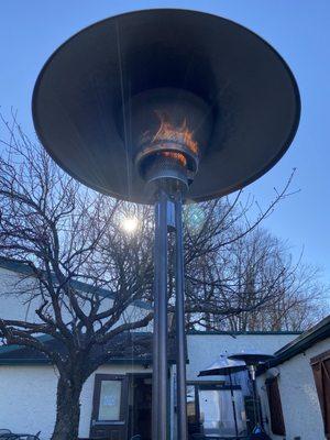 Sitting outside under a heat lamp- lovely being back.