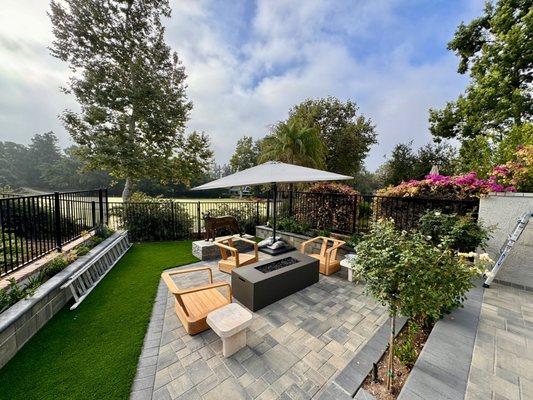 Interlocking Pavers, Pergola, Outdoor Kitchen, and Turf by Vitoli Landscape Design, Leading Landscape Contractor in Inglewood, CA.