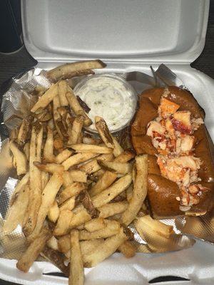 Warm lobster roll w fries and coleslaw