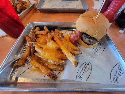 Prime beef burger,apple wood bacon, and cheese fries (they spared no cheese on these fries)