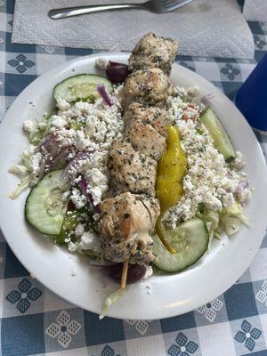 Chicken souvlaki and Greek salad