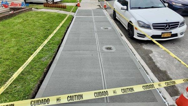 NYC DOT Sidewalk Violation Removal Demolition of existing old concrete. Installed welded wire mesh and pour out 4000PSI ready mix concrete.