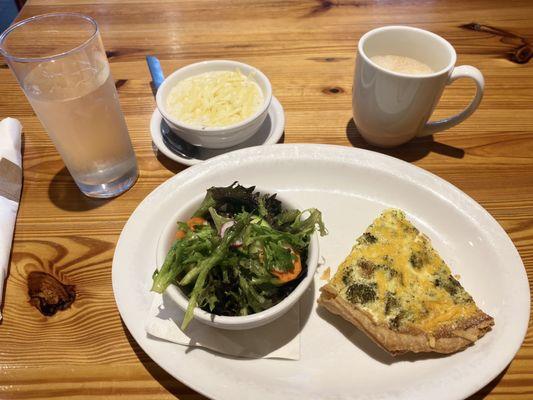 Quiche, grits, cappuccino, salad