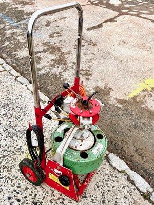 Professional snaking machine used to remove clogs in drain and sewer lines.