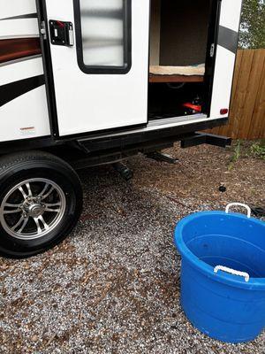 Bucket of human feces from the new travel trailer.