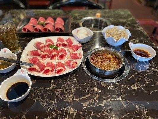 Sliced beef, US wagyu, egg, royal ramen, hot tea, butter base, sauces