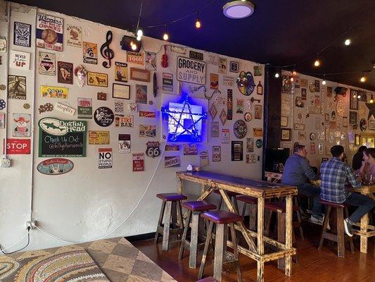 Interior decorated with signs and baskets.