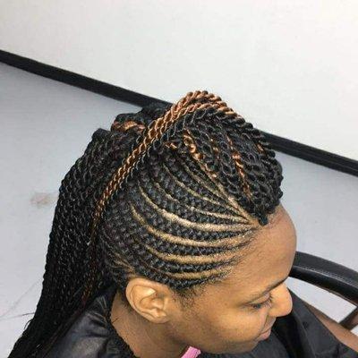 Cornrows on sides and Senegalese Twists in the middle (mohawk) by Amina African Hair Braiding