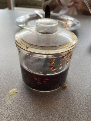 A small container of hot chili oil allows you to control the spiciness.