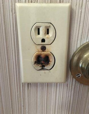 Burnt out electrical socket.