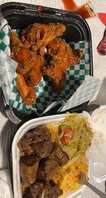 Ox tails, yellow rice, macaroni and cabbage, chicken