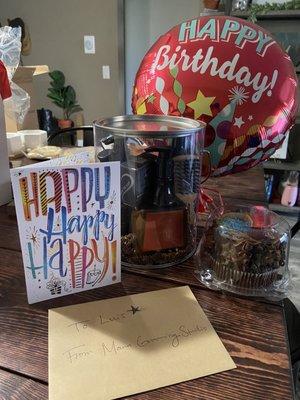 They gave me this awesome gift bucket with hair and self care products. Also hand written card, balloon, and Cupcake!! So thoughtful!!!