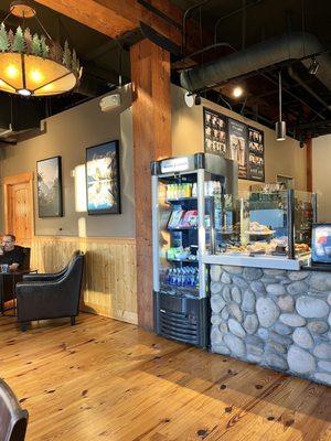 Inside counter with pastries and drink menu!