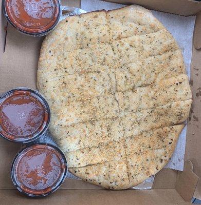 Breadsticks with marinara.