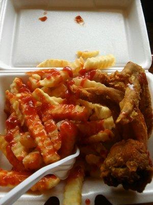 Fried chicken wings with french fries