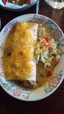 Pepe's green chile con carne smothered burrito. Sauce was watery and lacking flavor. Overall, not a good burrito. "C-."