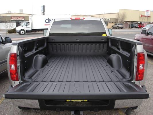 Truck sprayed with Premium Black Line-X Bedliner